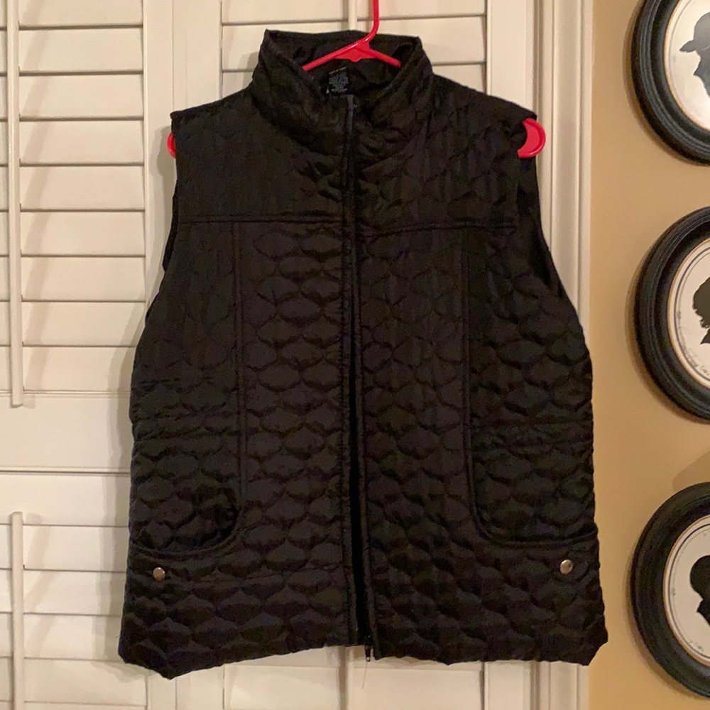 New Directions black vest.